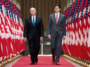 U.S. Vice-President Mike Pence and Prime Minister Justin Trudeau walk to a joint news conference in Ottawa, May 30, 2019.