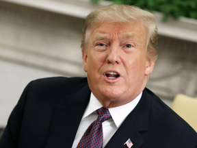 U.S. President Donald Trump speaks to reporters about trade with China and other issues, at the White House on May 13, 2019.