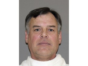 FILE - This undated file photo provided by the Denton County Jail shows John Wetteland. An attorney for Wetteland, Derek Adame said Monday, May 13, 2019, that his client is "completely shocked" by the allegations as the former All-Star and World Series MVP pitcher made his first court appearance in Texas on child sex abuse charges nearly five months after his arrest. (Denton County Jail via AP, File)