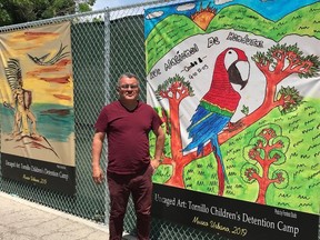 This photo taken April 23, 2019, shows El Paso historian David Romo who is co-curator of the "Caged Art" exhibition, which opened at UTEP's Centennial Museum and will also open in a separate exhibit May 4th in the historic El Paso neighborhood of Duranguito, where many Central Americans migrants are daily dropped off. The teenagers created the artwork while in federal detention at the Tornillo camp.