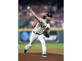 Houston Astros starting pitcher Gerrit Cole throws against the Chicago Cubs during the first inning of a baseball game Monday, May 27, 2019, in Houston.