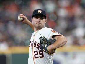 Houston Astros starting pitcher Corbin Martin throws to a Chicago White Sox batter during the first inning of a baseball game Thursday, May 23, 2019, in Houston.