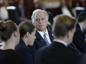 Texas state Sen. Kirk Watson, center, listens to testimony during a hearing about the statute of limitations child sex abuse victims have to sue their abusers, Monday, May 13, 2019, in Austin, Texas. In Texas, lawmakers quietly removed a bill's provision allowing child sex abuse victims to sue institutions and are now shielding the very groups that lobbied them to do so.