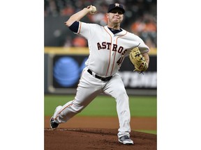 Houston Astros starting pitcher Brad Peacock delivers during the first inning of a baseball game against the Chicago White Sox, Monday, May 20, 2019, in Houston.