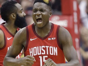 Houston Rockets center Clint Capela reacts after making a basket during the first half of Game 4 of a second-round NBA basketball playoff series against the Golden State Warriors, Monday, May 6, 2019, in Houston.