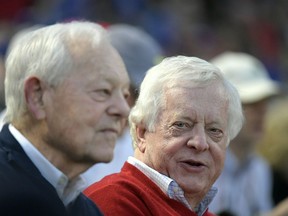 Bob Schieffer, left, Tom Schieffer enjoying the game as Angels play Rangers at Globe Life Park in Arlington, Texas, Wednesday, April 11, 2018.  Between them, the Schieffer brothers of Fort Worth have moderated presidential debates, anchored network newscasts for 35 years, built a pro baseball stadium and team and served America as one of our leading diplomats.