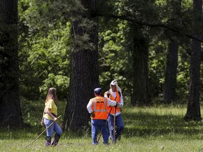 Members of Texas EquuSearch conduct a search for four-year-old Maleah Davis Monday, May 6, 2019, in Humble, Texas. Houston police are trying to determine what happened to the 4-year-old girl after her stepfather said she was taken by men who released him and his 2-year-old son after abducting them as well.