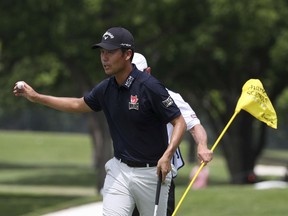 Kevin Na gestures after making a birdie on the sixth green in the final round of the Charles Schwab Challenge golf tournament Sunday, May 26, 2019, in Fort Worth, Texas.