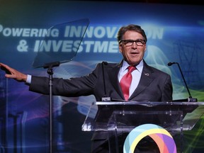 U.S. Energy Secretary Rick Perry speaks at an energy summit hosted by Utah Gov. Gary Herbert and attended by Wyoming Gov. Mark Gordon Thursday, May 30, 2019, in Salt Lake City.