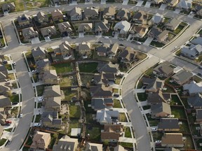 This April 13, 2019, photo, shows homes in suburban Salt Lake City. For millennials looking to buy their first home, the hunt has felt like an anxious race against the clock.