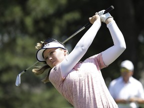 Brooke Henderson watches his tee shot on the second hole during the final round of the Pure Silk Championship golf tournament at Kingsmill Resort, in Williamsburg, Va., Sunday, May 26, 2019.