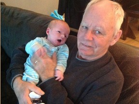 Archie Windsor holds his grandson in an undated family handout photo supplied by Windsor. At first, Archie Windsor of Duncan, B.C., says he was shocked to learn he had the same last name as the newest Royal, then he saw the humour.