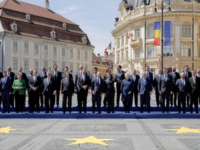 European Union leaders pose for a group photo at an EU summit in Sibiu, Romania, Thursday, May 9, 2019. European Union leaders on Thursday start to set out a course for increased political cooperation in the wake of the impending departure of the United Kingdom from the bloc.