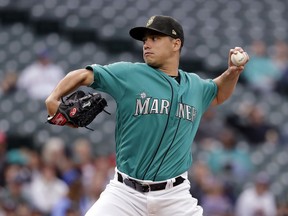 Seattle Mariners starting pitcher Marco Gonzales throws against the Minnesota Twins during the first inning of a baseball game Friday, May 17, 2019, in Seattle.