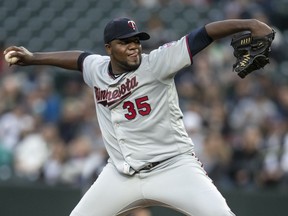 Minnesota Twins starter Michael Pineda delivers a pitch during the second inning of the team's baseball game against the Seattle Mariners, Thursday, May 16, 2019, in Seattle.