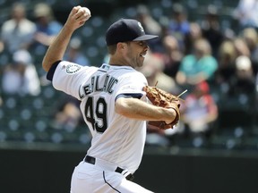 Seattle Mariners starting pitcher Wade LeBlanc throws against the Texas Rangers during the first inning of a baseball game, Wednesday, May 29, 2019, in Seattle.