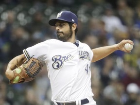 Milwaukee Brewers starting pitcher Gio Gonzalez throws during the first inning of a baseball game against the Cincinnati Reds Tuesday, May 21, 2019, in Milwaukee.