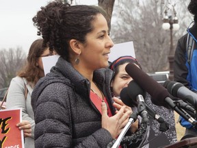In this image provided by MoveOn, Rahna Epting speaks at a rally against the administration's immigration policy on Feb. 7, 2019, at the U.S. Capitol in Washington. The grassroots liberal group MoveOn has named, Epting, its chief of program, as its next executive director.
