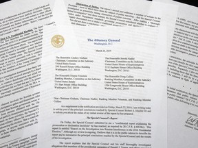FILE - In this March 24, 2019, file photo, a copy of a letter from Attorney General William Barr advising Congress of the principal conclusions reached by special counsel Robert Mueller, is photographed in Washington. Mueller expressed frustration to Barr l in March 2019, about how the findings of his Russia investigation were being portrayed, saying he worried that a letter summarizing the main conclusions of the probe lacked the necessary context, a Justice Department official said Tuesday night, April 30.