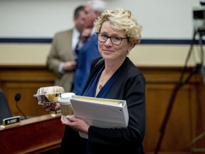FIEL - In this April 2, 2019, file photo, Rep. Chrissy Houlahan, D-Pa., arrives for a House Armed Services Committee budget hearing for the Departments of the Army and Air Force on Capitol Hill in Washington. Congresswomen with military service in their past, some of them forged on post-Sept. 11 wars, are hoping to create their own caucus to drive an agenda to support the nation's growing ranks of female service members.