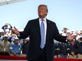 In this May 14, 2019, photo, President Donald Trump arrives to speak on energy infrastructure at the Cameron LNG export facility in Hackberry, La. Trump's latest financial disclosure report is expected to provide a rare glimpse into whether his presidency has helped or hurt his hotels, golf resorts and other parts of his business empire.