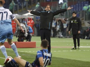 Lazio coach Simone Inzaghi gestures during the Italian Cup soccer final match between Lazio and Atalanta, at the Rome Olympic stadium, Wednesday, May 15, 2019.