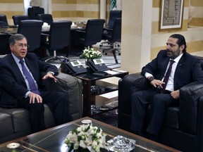 U.S. Deputy Assistant Secretary of State David Satterfield, left, speaks during his meeting with Lebanese Prime Minister Saad Hariri, in Beirut, Lebanon, Tuesday, May 14, 2019. Satterfield's visit comes a week after President Michel Aoun presented the U.S. ambassador to Lebanon with a "unified stance" regarding the demarcation of maritime border between Lebanon and Israel.