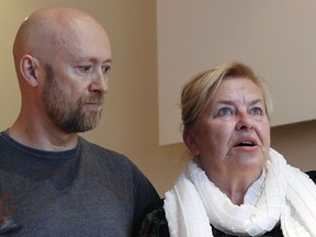 In this photo taken on May 15, 2019, Barbara Borowiecka and and Michal Wojciechowicz, both alleged survivors of abuse as minors by a prominent Solidarity-era priest talk, during an interview with The Associated Press. A documentary film with testimony by victims of clerical abuse in Poland is so harrowing that it has forced an unprecedented reckoning with the problem in one of Europe's most deeply Catholic societies. In December, Borowiecka, 62, told Polish media about being abused when she was 11 by Henryk Jankowski, a prominent prelate in Lech Walesa's anti-communist Solidarity movement in Gdansk, where a monument of him stood.