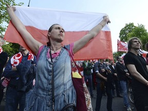The protesters included far-right groups and their supporters. They said the United States has no right to interfere in Polish affairs and that the U.S. government is putting "Jewish interests" over the interests of Poland.