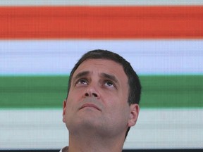 FILE - In this April 2, 2019 file photo, India's Congress Party President Rahul Gandhi looks skywards at a function to release the party's manifesto for the upcoming general elections in New Delhi, India. Political observers in India are examining whether the scion of the country's most important modern political dynasty can retain a seat in Parliament and revive his party's fortunes. With India's marathon general election inching toward the finish line, opposition Congress party leader Rahul Gandhi is beginning to seem like more of a credible leader. But it's unclear whether the 48-year-old has done enough to defeat Prime Minister Narendra Modi.