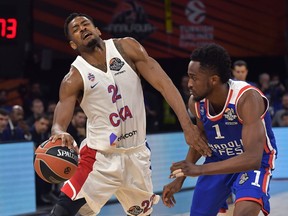 Moscow's Cory Higgins, left, drives to the basket as Anadolu's Rodrigue Beaubois tries to block him during their Final Four Euroleague final basketball match between Anadolu Efes Istanbul and CSKA Moscow at the Fernando Buesa Arena in Vitoria, Spain, Sunday, May 19, 2019.