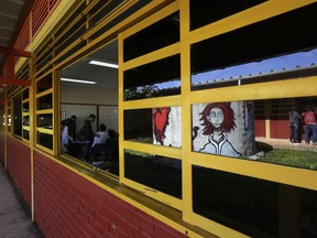 In this March 29, 2019 photo, students attend class the Ceilandia state school No. 7 in Brasilia, Brazil. A spokeswoman for the education ministry said it had no data on how many such schools existed nationwide. In Brasilia, the Ceilandia school is one of four to have voted in favor of adopting this model as a state pilot program.