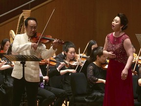South Korean Violinist Won Hyung Joon and his North Korean soprano partner, Kim Song Mi perform at the Shanghai Oriental Arts Center in Shanghai on Sunday, May 12, 2019. Won, a South Korean, performed together with Kim, a North Korean, in a rare joint performance they hope would help bring the divided Koreas closer together via music. Their performance comes three days after North Korea fired two suspected short-range missiles in the second such weapons test in five days.