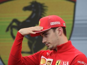 Ferrari driver Charles Leclerc of Monaco gestures during an autographs session at the Monaco racetrack, in Monaco, Friday, May 24, 2019. The Formula one race will be held on Sunday.