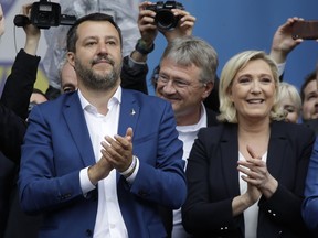 Matteo Salvini and Marine Le Pen, Leader of the French National Front, attend a rally organized by League leader Matteo Salvini, with leaders of other European nationalist parties, ahead of the May 23-26 European Parliamentary elections, in Milan, Italy, Saturday, May 18, 2019.