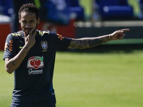 Brazil's Neymar points to a teammate during practice at the Granja Comary training center ahead of the Copa America soccer tournament in Teresopolis, Brazil, Sunday, May 26, 2019.