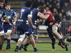 Crusaders Scott Barrett runs at the Blues defence during their Super Rugby match in Christchurch, New Zealand, Saturday, May 25, 2019.