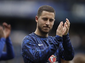 Chelsea's Eden Hazard waves to fans at the end of the English Premier League soccer match between Chelsea and Watford at Stamford Bridge stadium in London, Sunday, May 5, 2019.