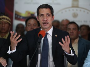Venezuela's opposition leader and interim president Juan Guaido, speaks during a press conference at his campaign office in Caracas, Venezuela, Tuesday, May 14, 2019. Since declaring Venezuela's President Nicolas Maduro as illegitimate, Guaidó has been in the midst of a power struggle with Maduro.
