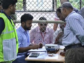Election officials begin counting votes of India's massive general elections, in New Delhi, India, Thursday, May 23, 2019. The count is expected to conclude by the evening, with strong trends visible by midday.