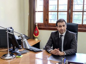 Khalid Zerouali, director of Migration and Border Surveillance in Morocco's Interior Ministry, poses for a photo during an interview with the Associated Press in Rabat, Morocco, Thursday, May 16, 2019. Khalid Zerouali said the North African kingdom, now migrants' main gateway to Europe, is using new tactics to cut into the surge of migrants, aborting about 25,000 attempts to reach Spain so far this year.