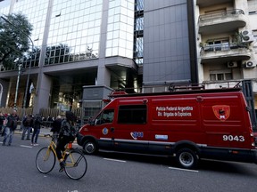 A van from the Argentine Federal Police Explosion Brigade sits parked outside Congress after bomb threats in Buenos Aires, Argentina, Monday, May 13, 2019. Bomb threats were received at the annex building of the Chamber of Deputies and in the Casa Rosada, according to the official news agency Télam.