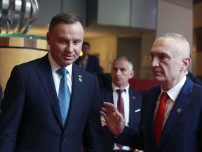 Poland's President Andrzej Duda speaks with his Albanian counterpart Ilir Meta, right, during the Brdo-Brijuni Process Leaders' Meeting in Tirana, Albania, on Thursday, May 9, 2019. The Brdo-Brijuni Process is an initiative created by Croatia and Slovenia in 2013 to push forward the regional accession into EU.