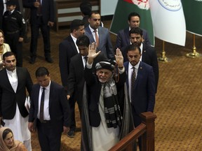 Afghan President Ashraf Ghani arrives on the last day of the Afghan Loya Jirga meeting in Kabul, Afghanistan, Friday, May 3, 2019. Afghan President Ashraf Ghani's grand council ends with a call for peace talks, urges both sides to hammer out a cease fire and protect rights gained in the last 17 years. Ghani offers cease fire, says he will free 175 Taliban prisoners ahead of Ramadan, the Islamic holy month when Muslims fast from sunrise to sunset.