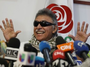 Former rebel leader Seuxis Hernandez, also known as Jesus Santrich, speaks during a press conference at the FARC party headquarters after he was freed from his second detention in connection with a drug case in Bogota, Colombia, Thursday, May 30, 2019. Colombia's Supreme Court decided that the former FARC peace negotiator, who is accused of conspiring to ship cocaine to the U.S., should be released and determined that his case is part of that court's jurisdiction because his post as a legislator.