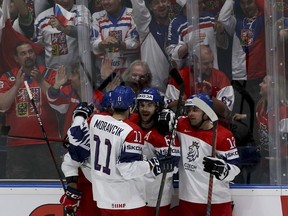 Czech Republic's players and supporters celebrate after scoring during the Ice Hockey World Championships group B match between Czech Republic and Switzerland at the Ondrej Nepela Arena in Bratislava, Slovakia, Tuesday, May 21, 2019.