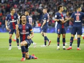 PSG's Edinson Cavani celebrates after scoring his side's second goal during their League One soccer match between Paris Saint Germain and Dijon at the Parc des Princes stadium in Paris, France, Saturday, May 18, 2019.