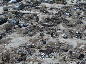An aerial shot shows widespread destruction caused by Cyclone Kenneth when it struck Ibo island north of Pemba city in Mozambique, Wednesday, May, 1, 2019. The government has said more than 40 people have died after the cyclone made landfall on Thursday, and the humanitarian situation in Pemba and other areas is dire. More than 22 inches (55 centimeters) of rain have fallen in Pemba since Kenneth arrived just six weeks after Cyclone Idai tore into central Mozambique.