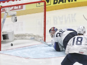 Goaltender Cory Schneider of the US fails to stop a shot by Russia's Kirill Kaprizov during the Ice Hockey World Championships quarterfinal match between Russia and the United States at the Steel Arena in Bratislava, Slovakia, Thursday, May 23, 2019.