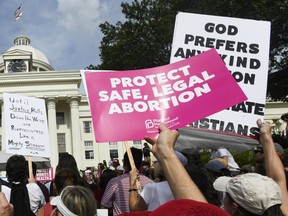 MONTGOMERY, AL - MAY 19: Protestors participate in a rally against one of the nation's most restrictive bans on abortions on May 19, 2019 in Montgomery, Alabama.